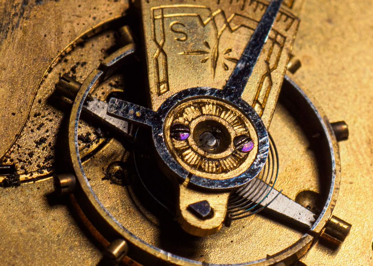 Close-up of a watch movement's balance wheel